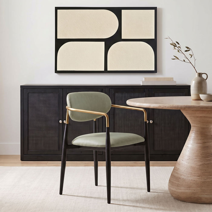 Black-legged vegan leather upholstered dining arm chair by Meridian Furniture, modern design with plush seating.