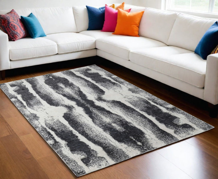 5' x 8' Abstract Hand Woven Wool Blend Area Rug - Black And White