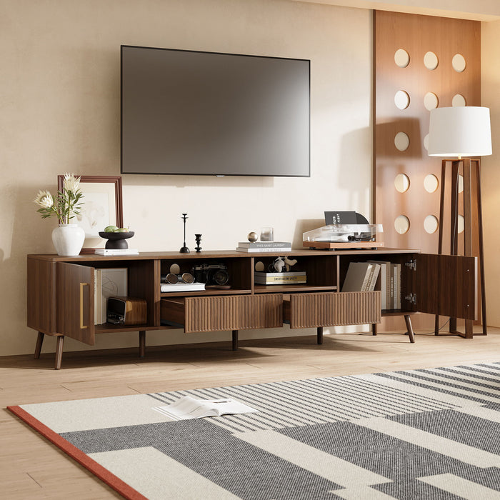 Giga walnut TV stand for TVs up to 85 inches with soft-close doors, open shelf, and cable management system.