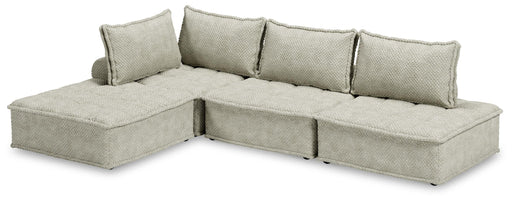 Ashley Furniture Bales 4-Piece Stationary Sectional sofa set with plush cushions and modern design, shown in a living room setting.