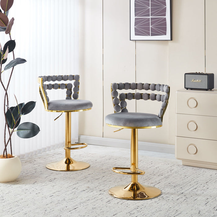 Set of two Giga modern bar stools with soft cushions, iron tube legs, and comfortable backrests for stylish seating.