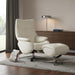 White genuine leather HomeRoots tufted manual swivel recliner with matching ottoman, showcasing plush upholstery and modern design.