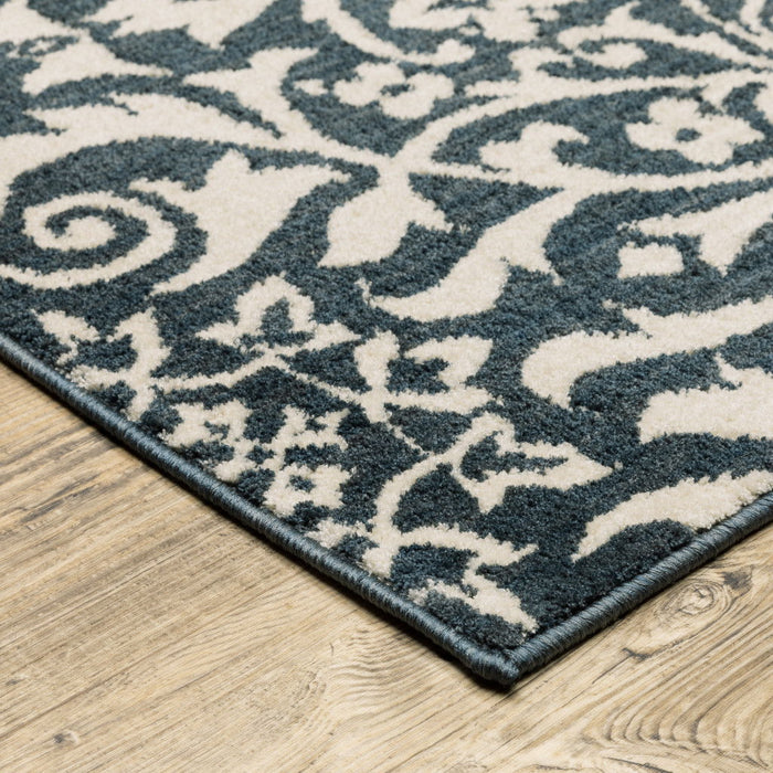 9.8' x 12.8' Floral Power Loom Stain Resistant Area Rug - Blue And Ivory