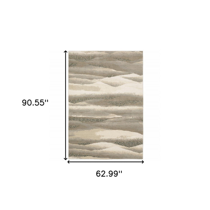 5.3' x 7.6' Abstract Power Loom Area Rug - Blue And Gray