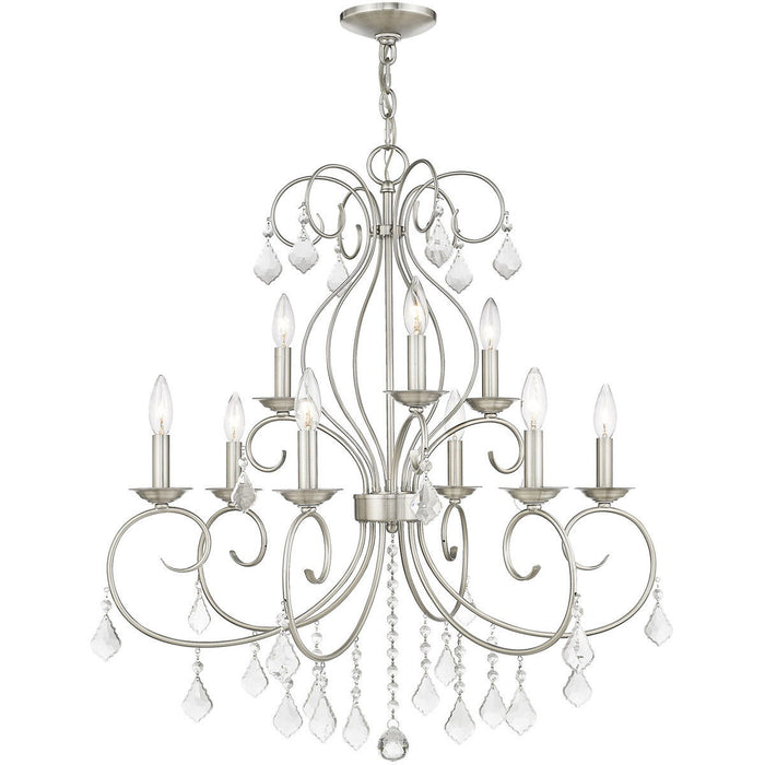 Nine-light metal chandelier with shades in nickel finish and clear glass, featuring dimmable design for elegant lighting.