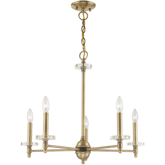HomeRoots five-light metal chandelier with antiqued brass finish and clear shades, featuring dimmable lighting and modern design.