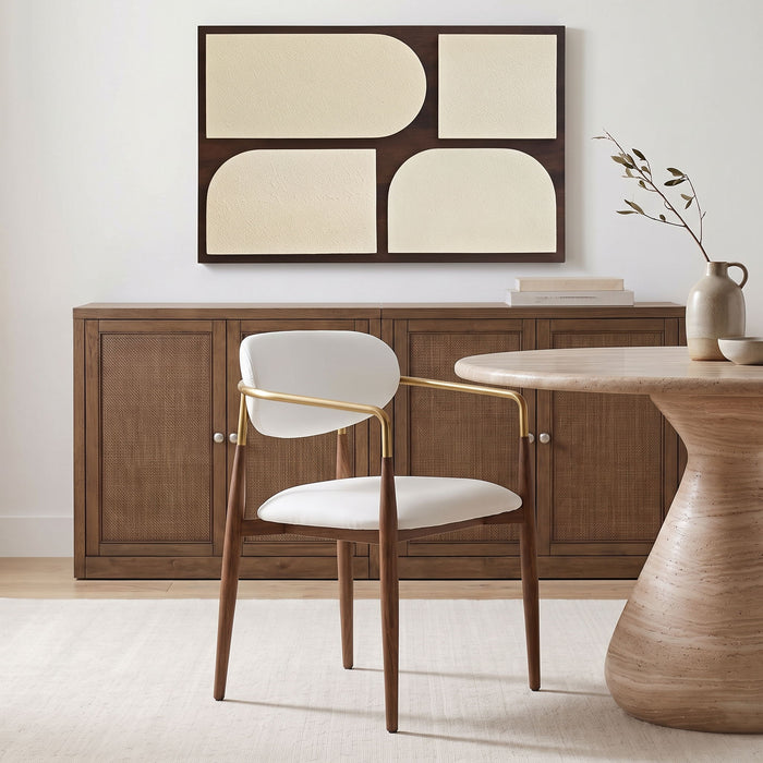 Vegan leather upholstered dining arm chair with walnut legs from Meridian Furniture, showing a modern, comfortable design.