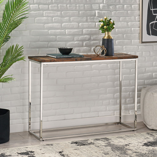 Giga brown and silver console table with sleek design, featuring a wooden top and metal legs for modern interior decor.