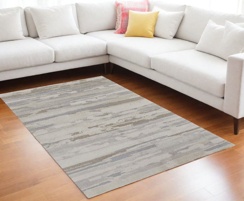 7' x 10' Abstract Power Loom Distressed Area Rug - Ivory And Gray