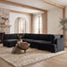 Velvet performance fabric upholstered Meridian Furniture 5-piece L-shaped sectional sofa in a stationary living room setting.