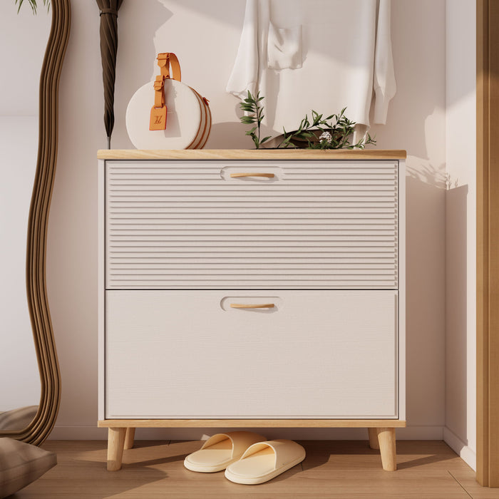 Giga narrow entryway shoe storage cabinet with white finish, two flip drawers, and wooden legs, ideal for organizing shoes neatly.