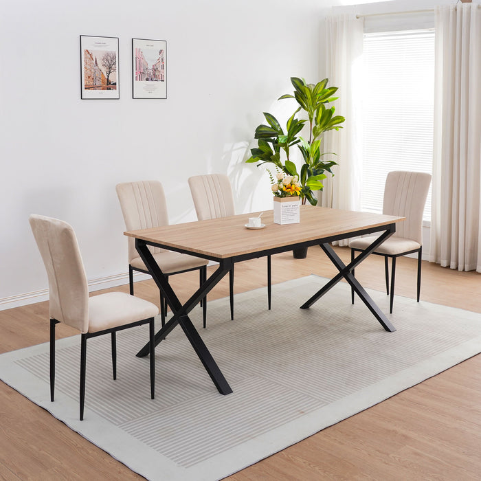 Set of four Giga velvet dining chairs with modern design, featuring plush upholstery and sleek wooden legs for stylish dining rooms.