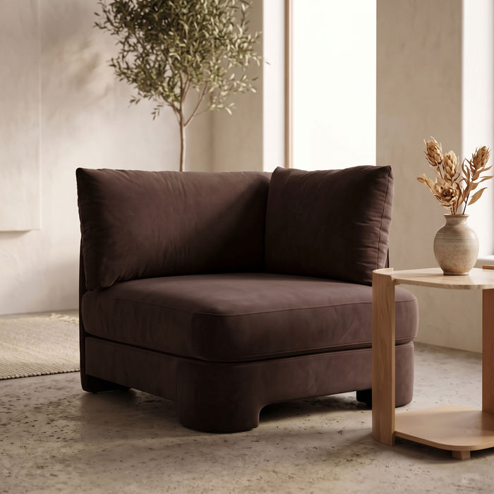 Meridian Furniture velvet upholstered stationary chair with plush fabric, modern design, and sturdy wooden legs.