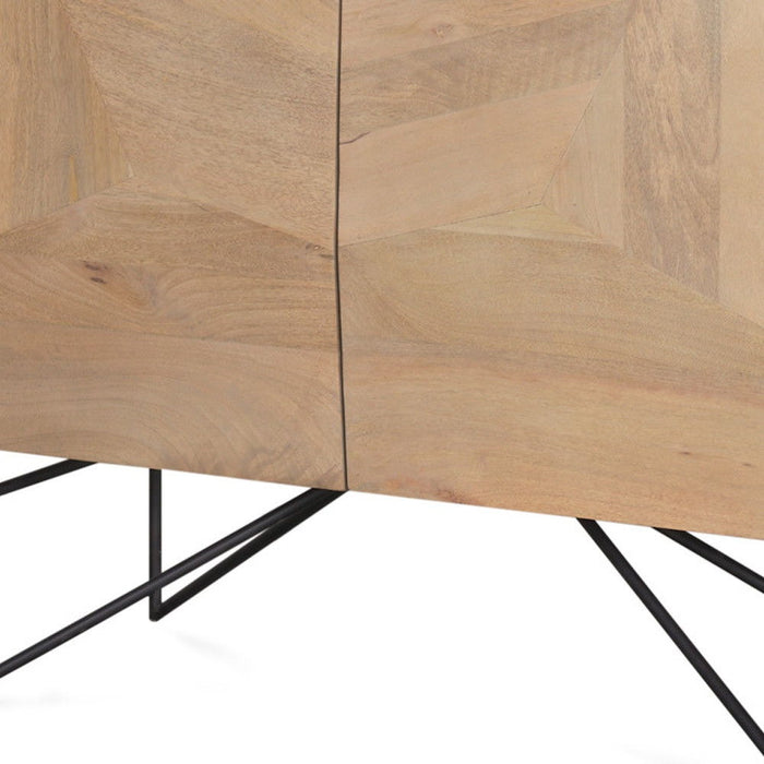 Natural wood and metal accent cabinet with carved geometric design and two doors, ideal for stylish home storage.