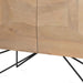 Natural wood and metal accent cabinet with carved geometric design and two doors, ideal for stylish home storage.