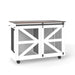 Giga mobile dog crate in brown and white with flip top feeding door, dual access, and 5-caster system with 2 locking casters.