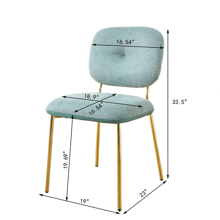 Set of two modern Giga green upholstered dining chairs with metal legs, space-saving contemporary accent seating.
