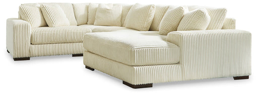 Lindyn 4-piece stationary sectional sofa by Signature Design by Ashley®, featuring plush cushions and modern fabric upholstery.