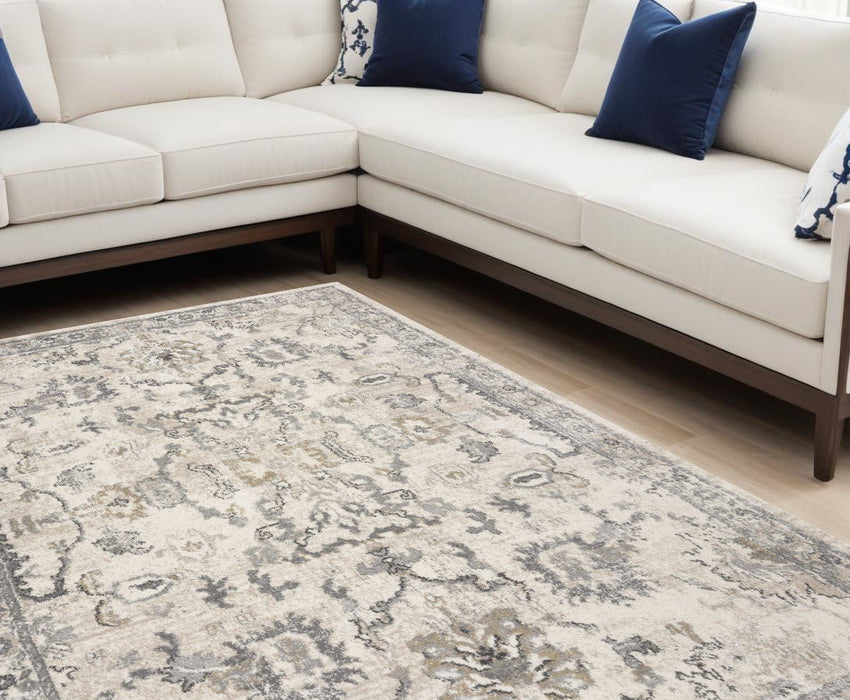 8' x 10' Machine Woven Distressed Floral Traditional Indoor Area Rug - Ivory