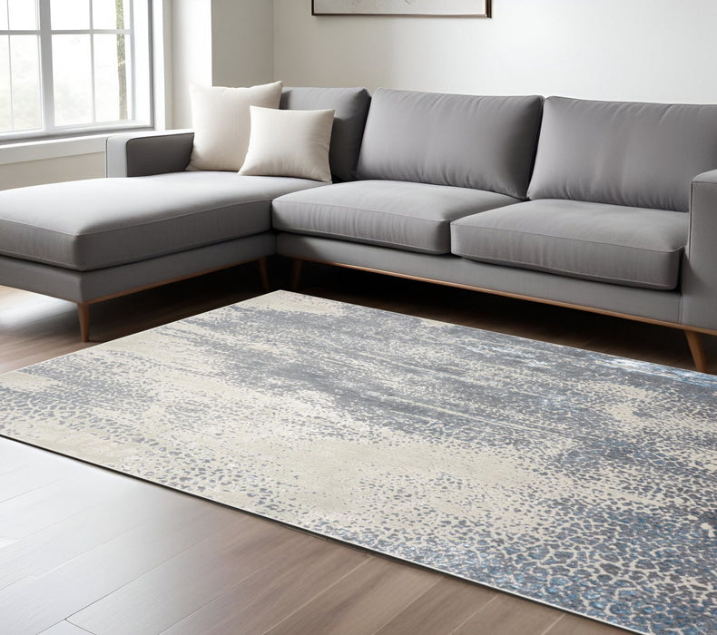 7' x 10' Abstract Stain Resistant Area Rug - Gray Blue And Ivory