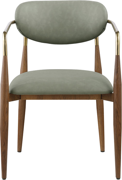 Vegan leather upholstered dining arm chair with walnut wood legs by Meridian Furniture, featuring a modern design and cushioned seat.