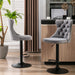 Set of two Giga modern upholstered swivel barstools with tufted backs and adjustable seats for home, pub, or kitchen island.