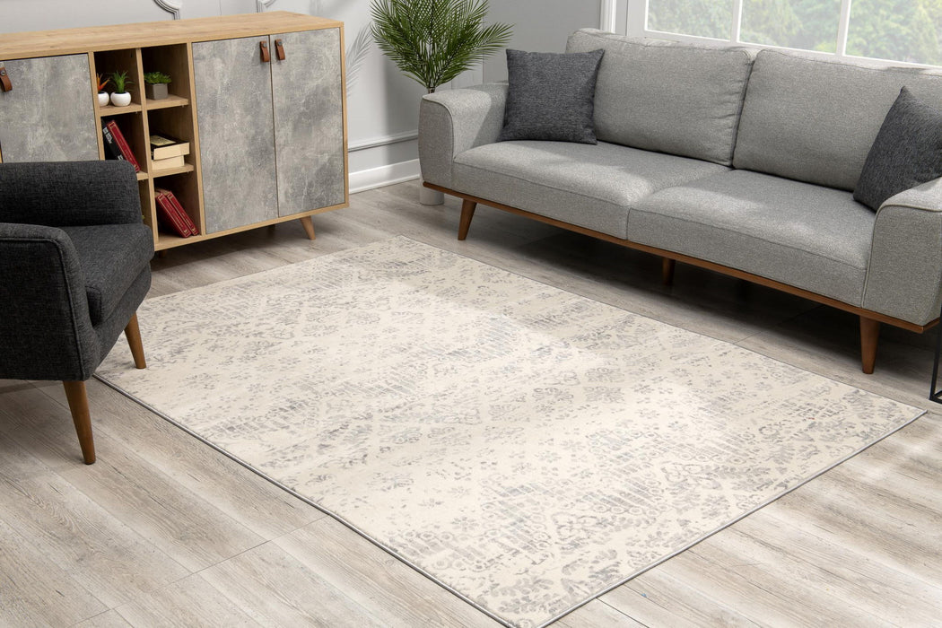 8' x 11' Distressed Ikat Pattern Area Rug - Ivory