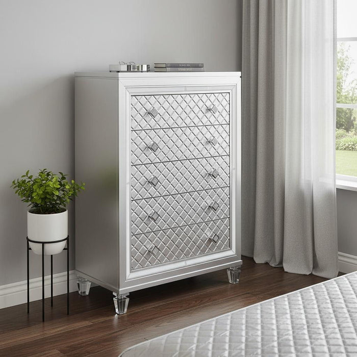 HomeRoots champagne accent chest with tapered acrylic legs and five drawers, showcasing a stylish storage piece.