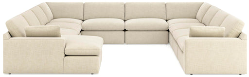 Benchcraft Elyza 10-piece linen stationary sectional with plush cushions and modern design, perfect for spacious living rooms.