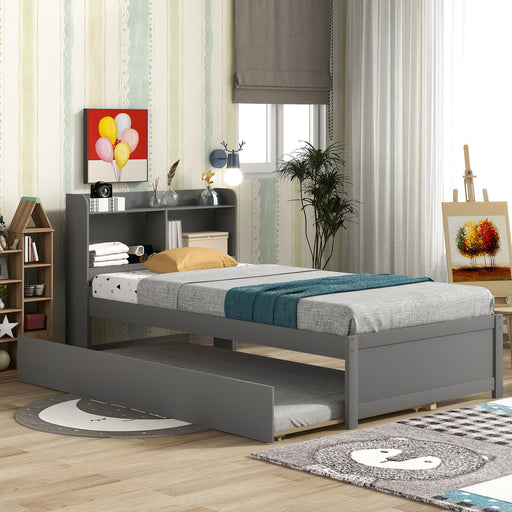 Giga twin trundle bed with integrated bookcase, featuring a wooden frame, mattress, and multiple shelves for storage and display.