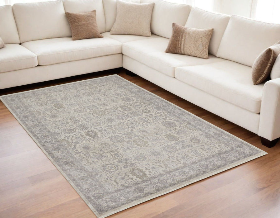 5' x 7' Oriental Power Loom Worn Faded Area Rug With Fringe - Gray And Ivory