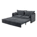 Giga pull-out sofa bed with convertible sleeper design, side storage, and USB-C charging ports in a modern living room setting.