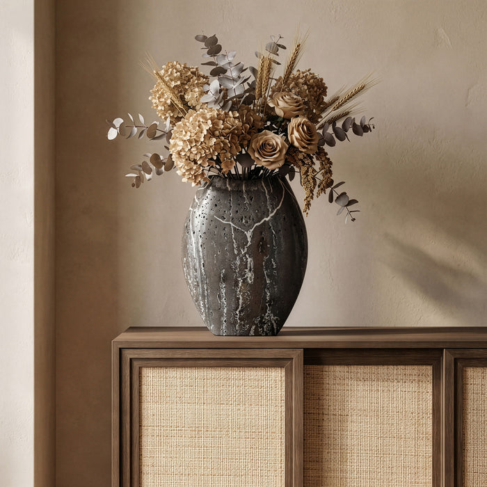 Sadie Meridain Furniture travertine vase with smooth, cylindrical shape and natural stone finish, perfect for home decor.
