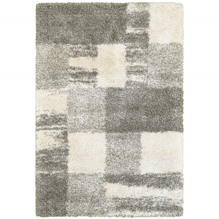6' x 9' Geometric Shag Power Loom Stain Resistant Area Rug - Gray Ivory And Silver