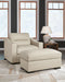 Signature Design by Ashley Treasure Trove almond stationary chair and ottoman set, featuring plush upholstery and modern design.