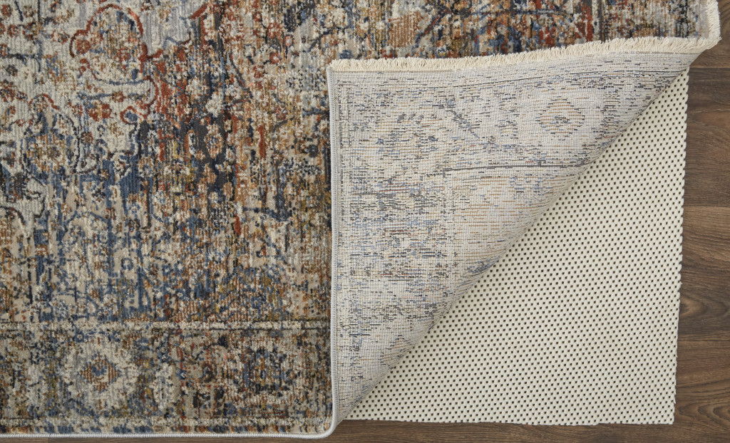 10' x 13' Floral Power Loom Distressed Area Rug With Fringe - Tan Orange And Blue