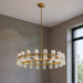 HomeRoots wagon wheel multi-light metal chandelier with gold finish and clear shades, featuring a rustic design and multiple light fixtures.