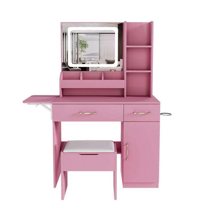 Pink Giga vanity desk set with LED mirror lights, 3 drawers, 7 shelves, and storage stool, featuring a power outlet charging station.