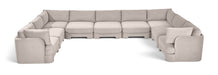 Meridian Furniture velvet upholstered 9-piece stationary sectional sofa with plush cushions and modern design.
