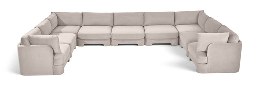Meridian Furniture velvet upholstered 9-piece stationary sectional sofa with plush cushions and modern design.