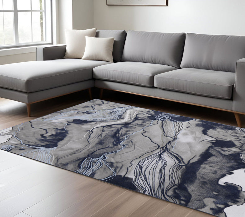 7' x 10' Abstract Power Loom Stain Resistant Area Rug - Blue Gray And Ivory