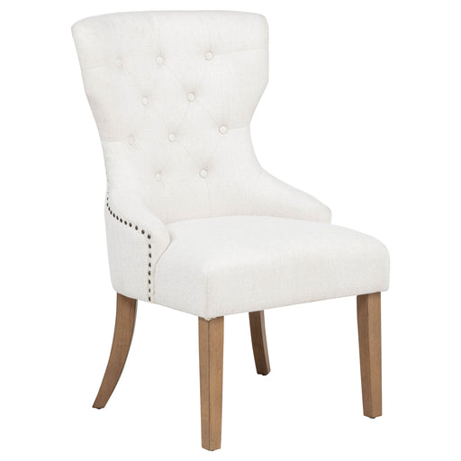 CoasterElevations Baney fabric upholstered dining side chair in beige and rustic honey, featuring comfortable cushioning and wooden legs.