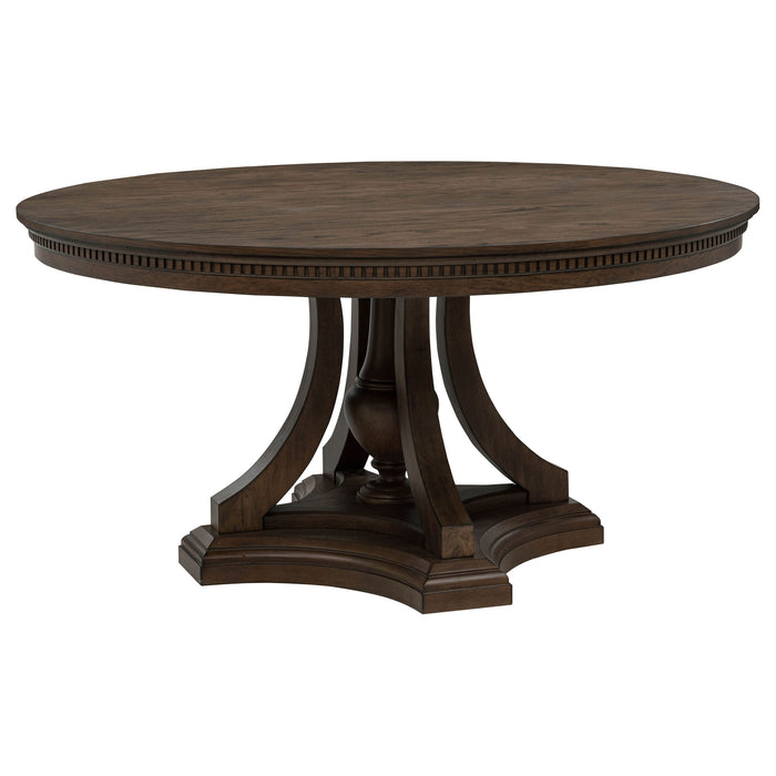 CoasterEveryday Ridgewell round pedestal dining table in dark oak wood with smooth tabletop and sturdy base, ideal for dining rooms.