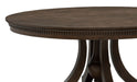 Dark oak Ridgewell round pedestal dining table by CoasterEveryday with a sturdy wooden design and smooth tabletop surface.