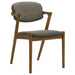 Pair of Malone padded wood dining arm chairs in dark walnut wood with upholstered seats, from CoasterEssence, set of two.