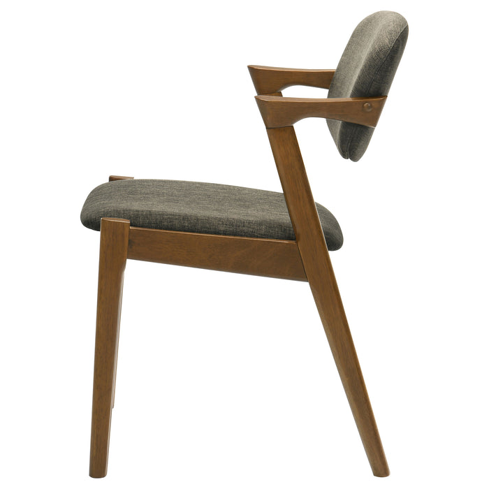 Pair of Malone padded wood dining arm chairs by CoasterEssence with dark walnut finish, featuring cushioned seats and armrests.