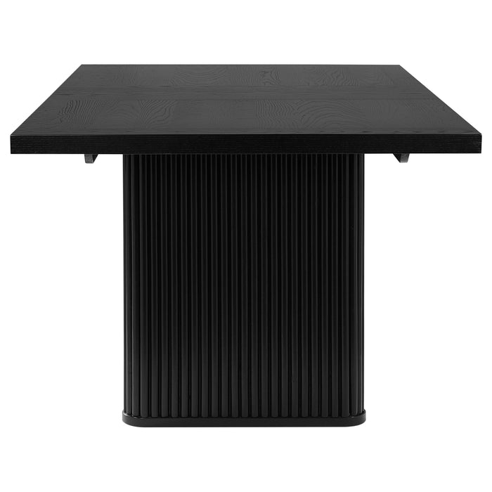 Black Catherine rectangular 84-inch wood dining table by CoasterEveryday, showing its sleek tabletop and sturdy wooden legs.