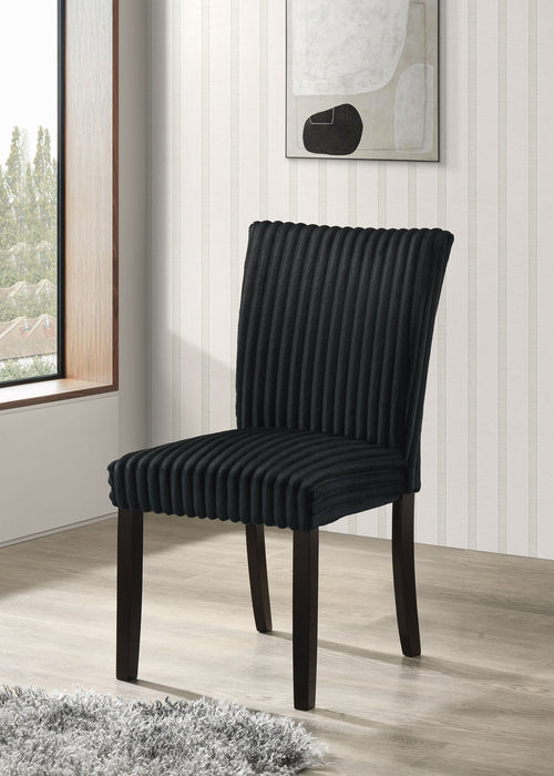 Set of two black Dermott upholstered Parson dining side chairs by CoasterEveryday, featuring plush fabric and sleek wooden legs.
