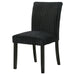 Two black Dermott upholstered Parson dining side chairs with sleek design and padded seats, ideal for modern dining rooms.