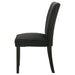 Pair of black Dermott upholstered Parson dining side chairs by CoasterEveryday, featuring cushioned seats and sleek wooden legs.